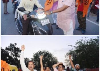 धर्मयात्रा तैयारी: नववर्ष समारोह समिति अध्यक्ष गणेश बोथरा और भाजपा नेता महावीर रांका की अगुवाई में वाहनों पर लगाए ध्वज व स्टीकर, टीशर्ट का किया वितरण